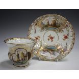 A Meissen porcelain teacup and saucer, late 19th century, outside factory decorated, painted with