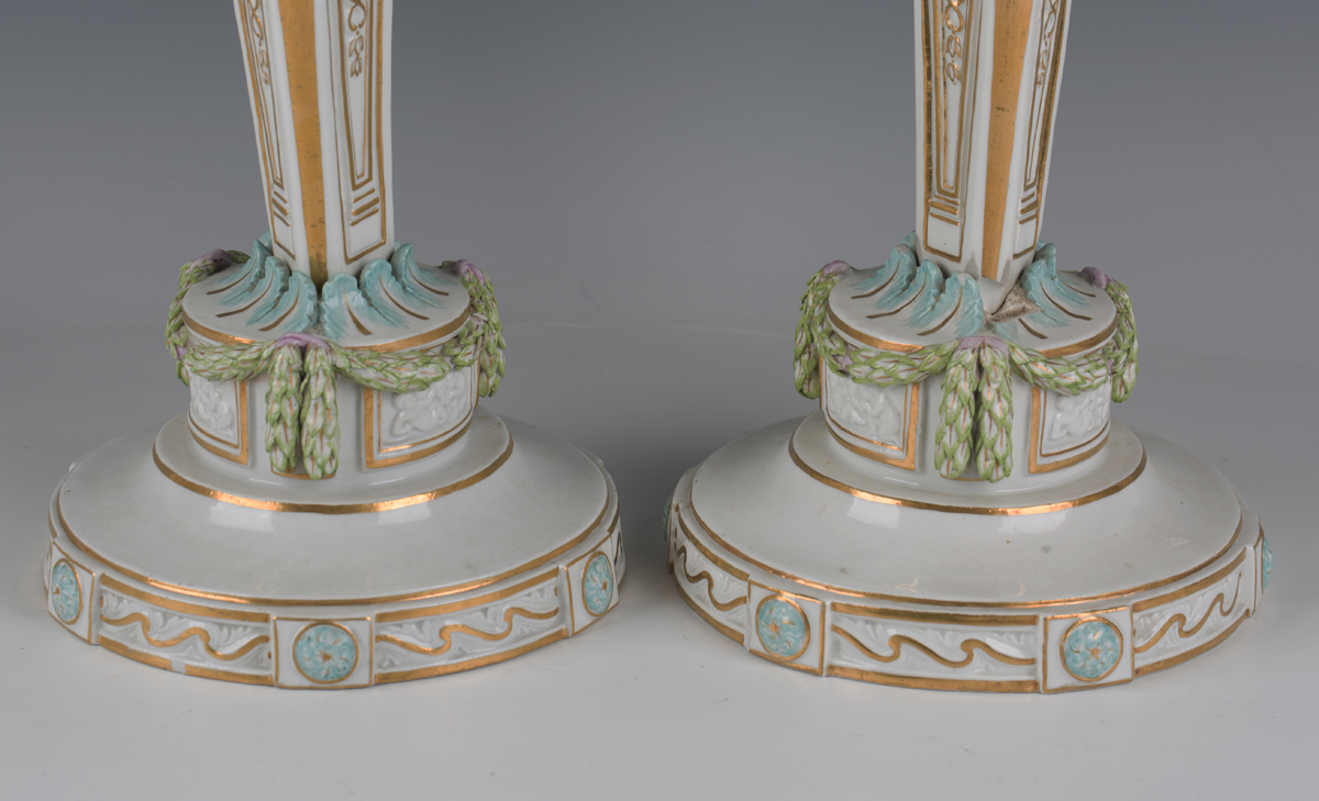 A pair of Meissen candlesticks, 19th century, modelled after Leuteritz as a triangular stem hung - Image 8 of 9