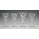 A matched set of four Lalique frosted and clear glass Molsheim pattern wine glasses, circa 1924,