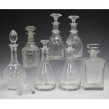 Seven glass decanters and stoppers, 19th and 20th century, four with cut detail, including two