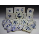 A group of approximately sixty Dutch Delft blue and white tiles, late 19th/early 20th century,