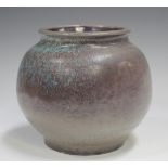 A studio pottery vase, early 21st century, of bulbous form, covered in a streaky purple and pale