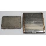 A George V silver cigarette case of rectangular form with engine turned decoration and gold borders,