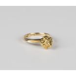 A gold ring, detailed '18ct', mounted with a gold nugget, weight 4.4g, ring size approx L.Buyer’s