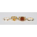 A gold ring, mounted with a cushion cut amber, detailed '14K', weight 6.6g, ring size approx R, a