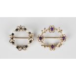 A gold, sapphire and cultured pearl brooch in a circular design with tied bow motifs, London 1984,