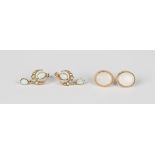 A pair of 9ct gold and oval opal single stone earstuds with post and differing butterfly fittings,