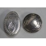 A George III silver patch box of elliptical form, the hinged lid engraved with a pendant, Birmingham