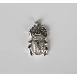 A Middle Eastern diamond pendant, designed as a scarab beetle, unmarked, length 2.8cm, with a case.