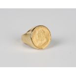 A Victoria Old Head half-sovereign 1893 in an 18ct gold ring mount, weight 13.8g, ring size approx