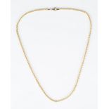 A gold multiple link neckchain, detailed '750', on a gold sprung hook shaped clasp, detailed '