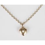 A gold and cultured pearl heart shaped pendant locket, weight 4g, length 2.7cm, with a 9ct gold