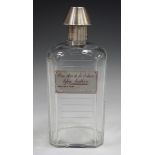 A late Victorian silver mounted cut clear glass novelty medicine decanter and stopper, the