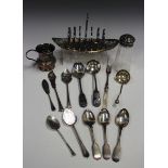 A small group of silver and plated items, including a silver topped glass sugar sifter, Sheffield