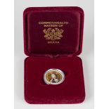 A Ghana gold proof five hundred sika 2002, with original box.Buyer’s Premium 29.4% (including