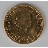 An Elizabeth II sovereign 1965.Buyer’s Premium 29.4% (including VAT @ 20%) of the hammer price. Lots