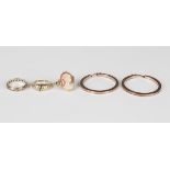 A pair of 9ct gold hoop shaped earrings, weight 3.4g, diameter 3.8cm, a 9ct gold ring, mounted