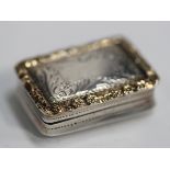 A William IV silver and parcel gilt vinaigrette of rectangular outline, engraved with a band of