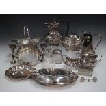 A collection of assorted plated items, including a four-piece tea set of half-reeded cushion form,