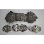 A late Victorian silver three-piece lady's waist belt buckle with cast and pierced decoration,