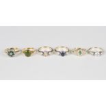 A 9ct gold, emerald and colourless gem set cluster ring, weight 2.7g, ring size approx O, three