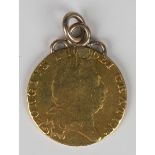 A George III spade guinea 1794, mounted as a pendant.Buyer’s Premium 29.4% (including VAT @ 20%)