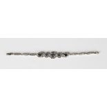 A sapphire and diamond bracelet, circa 1940s, the front mounted with a row of five oval cut