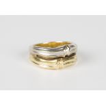 A two colour gold ring in an abstract design, detailed 'Cetas 750', weight 10g, ring size approx Q.