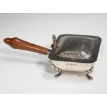 An Elizabeth II silver silent butler of rectangular warming pan form, the hinge lid with engraved