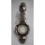 An Edwardian silver mounted novelty pocket barometer case, modelled in the form of a wheel barometer