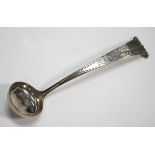 A George III Scottish silver scroll end sauce ladle, engraved with a crest and motto 'Apulia',