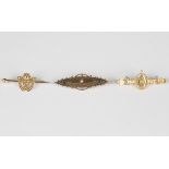 A late Victorian 9ct gold and diamond bar brooch, mounted with the central rose cut diamond within a