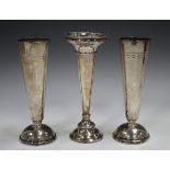 A pair of Elizabeth II silver specimen vases, each on a domed circular foot, Sheffield 1953, by