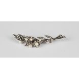 A diamond and cultured pearl brooch, designed as a floral and foliate spray, mounted with rose cut