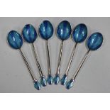 A set of six George VI silver and enamelled teaspoons, each bowl interior and finial with blue and