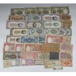 A group of Chinese banknotes, mostly Central Bank of China, and further foreign banknotes, including