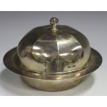 A George V silver muffin dish, liner and domed cover with octagonal knop finial, Sheffield 1930 by