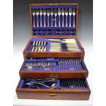 An Edwardian canteen of plated Old English pattern cutlery, mostly twelve place settings,