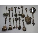 A collection of mostly Continental silver cutlery, the majority spoons, including a Dutch cake slice