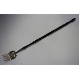 An Edwardian silver toasting fork with turned and spiral fluted ebonized handle, Chester 1901 by