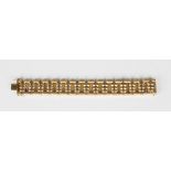 A gold wide oval link bracelet, the outer links with a brushed finish, on a snap clasp, detailed '