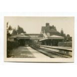 A collection of approximately 22 postcards of railway stations in East Sussex, including