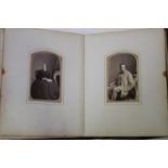 PHOTOGRAPHS. An album with olive wood boards containing approximately 53 albumen-print photographs