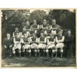 FOOTBALL. A black and white photograph of the Arsenal football team, circa 1933-1935, signed by