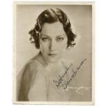 AUTOGRAPHS. A collection of approximately 23 photographs signed by Gladys Cooper, Anna Neagle,