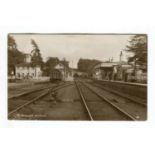 A collection of 13 postcards of railway stations in Kent, including photographic postcards titled '