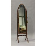 A 20th century Queen Anne style walnut framed cheval mirror, height 160cm, width 40cm.Buyer’s