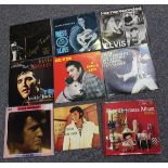 A collection of Elvis Presley LP records and singles.Buyer’s Premium 29.4% (including VAT @ 20%)