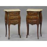 A pair of late 20th century French kingwood and foliate inlaid bombé bedside chests with marble tops