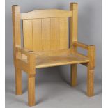 A mid-20th century Arts and Crafts style oak hall seat of large proportions, possibly Cotswold